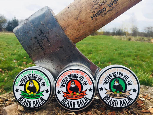 Weird Beard Oil Co. product packaging with a rustic background.