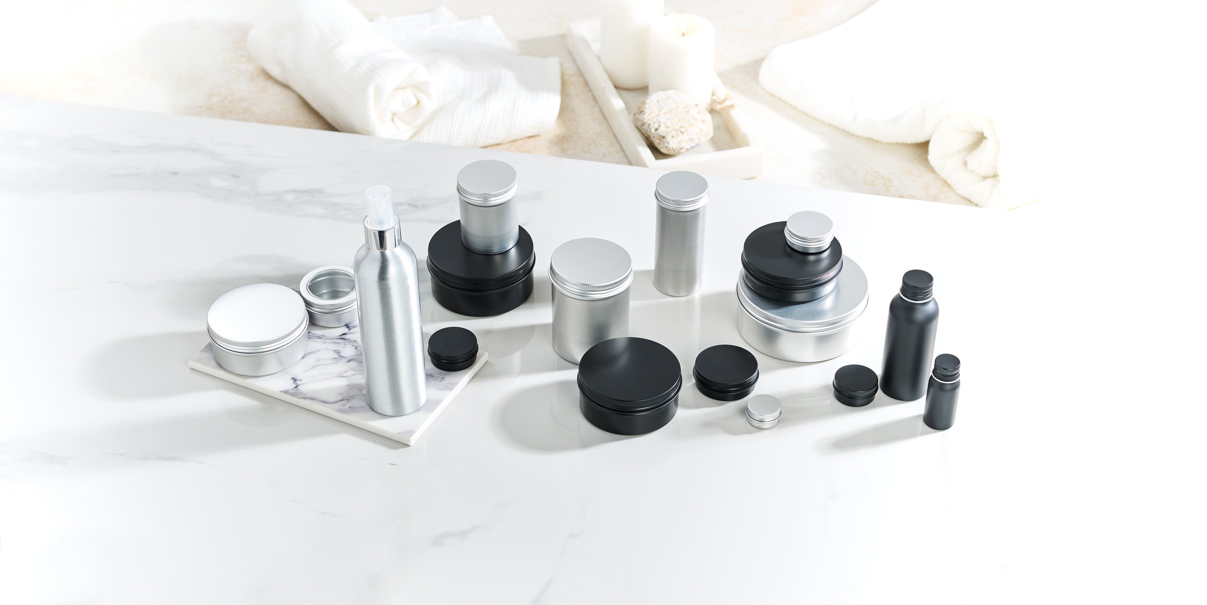 aluminium tins on marble tile